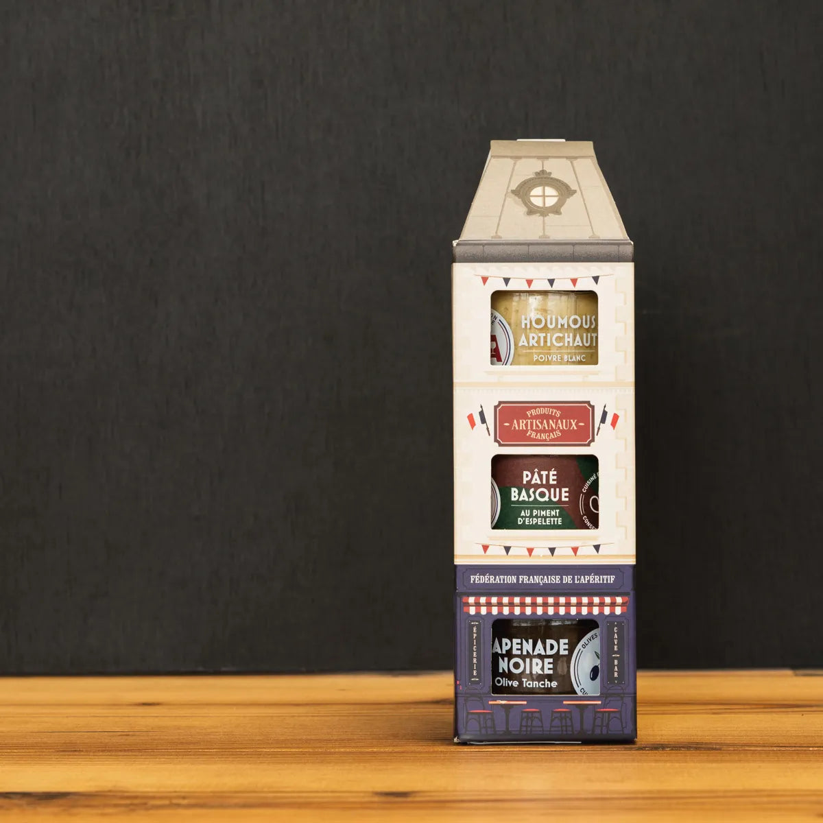 Coffret apéritif FFA Triplette Haussmann avec houmous artichaut, pâté basque et tapenade noire, produits artisanaux français.