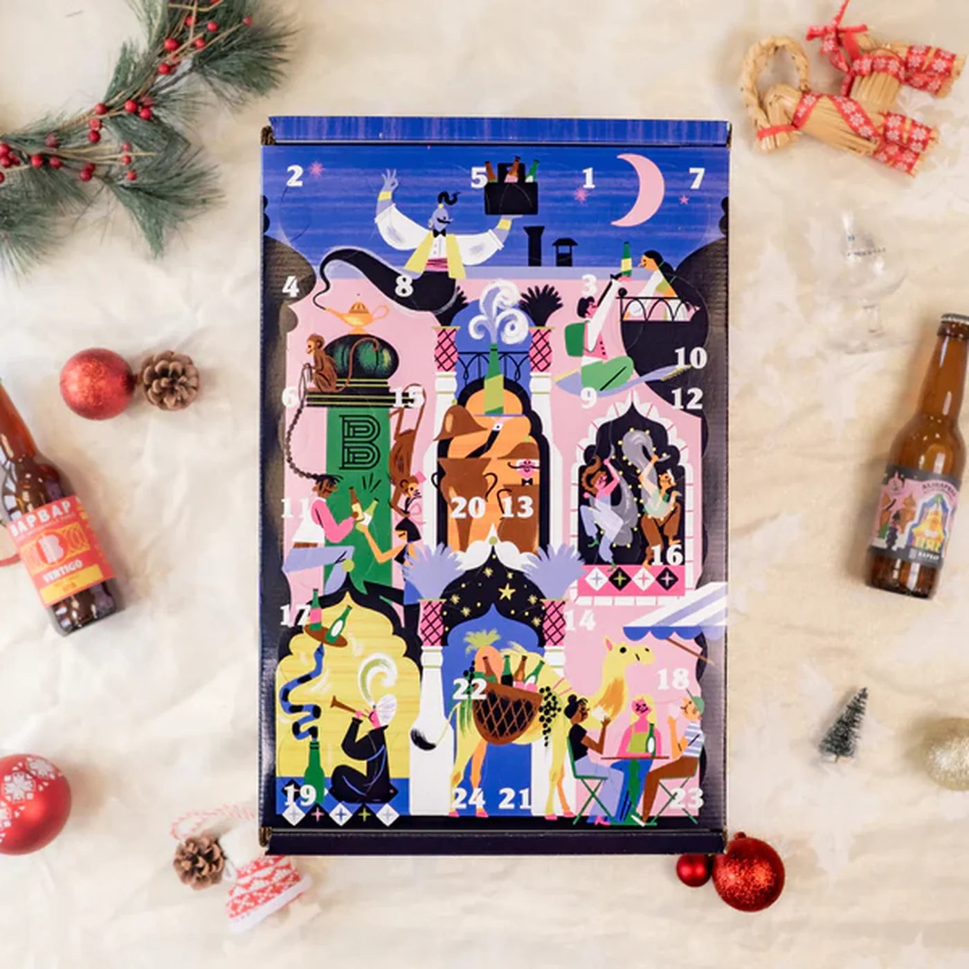 Calendrier de l’avent bière BAPBAP, ambiance de Noël, entouré de décorations festives et de bières artisanales pour un apéritif gourmand.